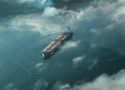 While the tanker Exxon Valdez spilled nearly 11 million gallons of oil into Alaskan waters, a trifecta of other sizable oil spills followed on its heels. These spills helped pave the way for passage of the Oil Pollution Act of 1990, which would vastly improve oil spill prevention, response, and restoration. (NOAA) Aerial view of Exxon Valdez tanker with boom and oil on water.